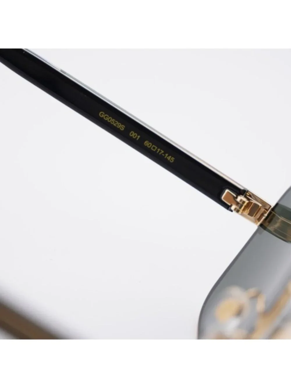 Gucci GG0529S 001 Sunglasses Gold with Black Square Frame, Grey Lenses